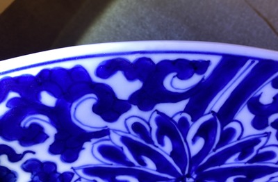 A Chinese blue and white 'lotus scroll' charger, Kangxi